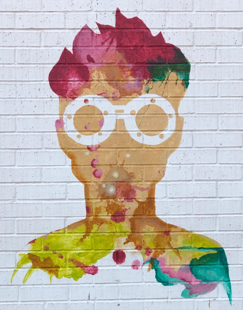 Mural of a colorful girl on Magnolia in Fort Worth, Texas