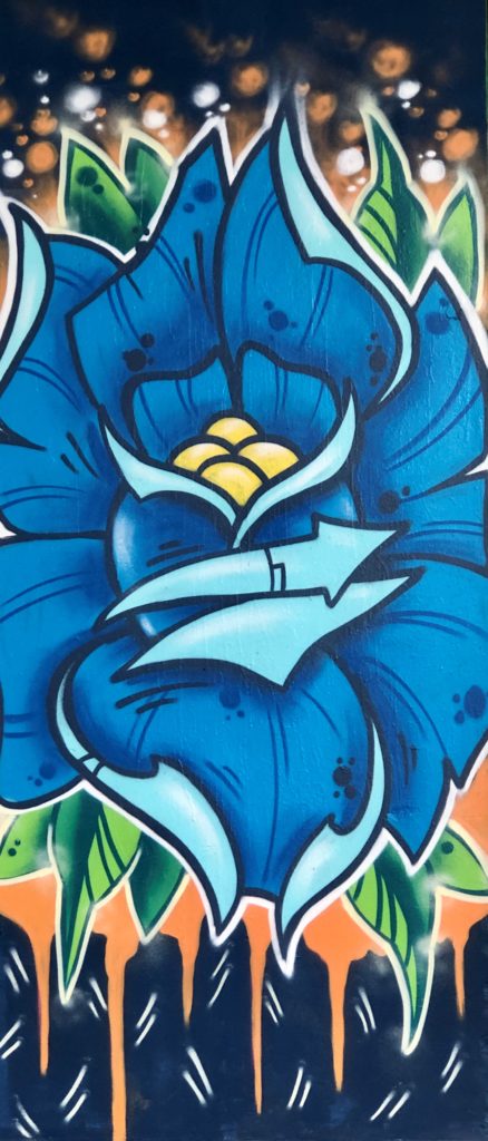 Mural of a blue flower at Trinity Park in Fort Worth, Texas