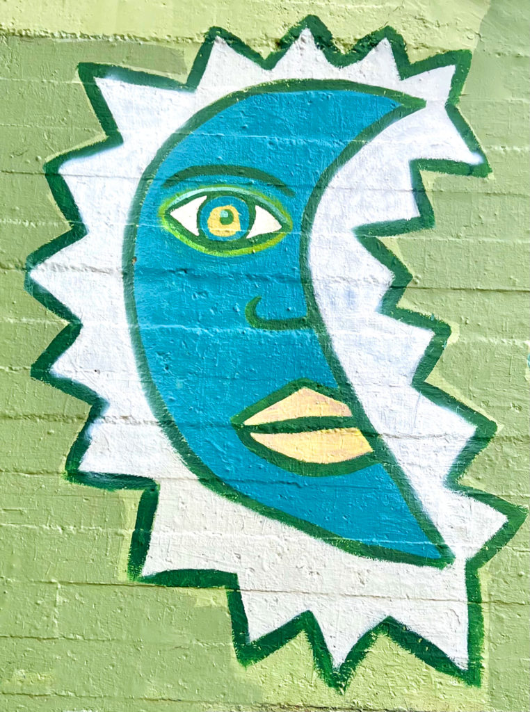 Blue moon on green, Walls of Peace mural, at Lowden and Adams Street in Fort WorthSt Walls of Peace