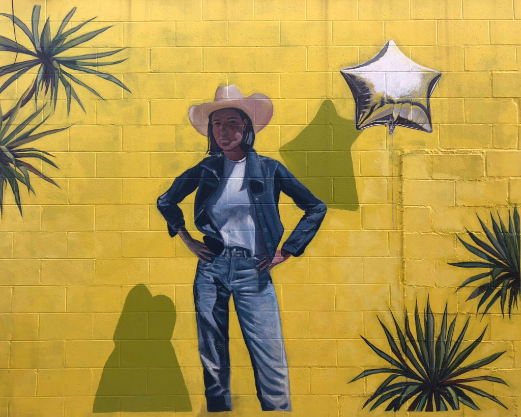 Mural of cowgirl in Inspiration Alley in Fort Worth Foundry District