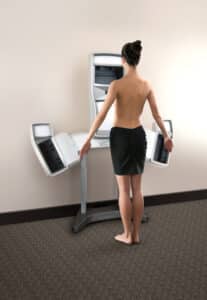 Image of woman doing Vectra XT 3-d imaging