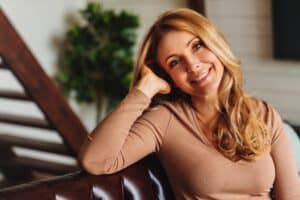 Beautiful women with proportional breast reconstruction with breast implant results
