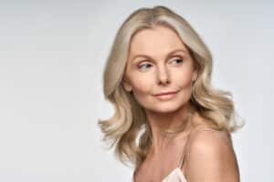 Lively senior woman has a refreshed look following blepharoplasty.