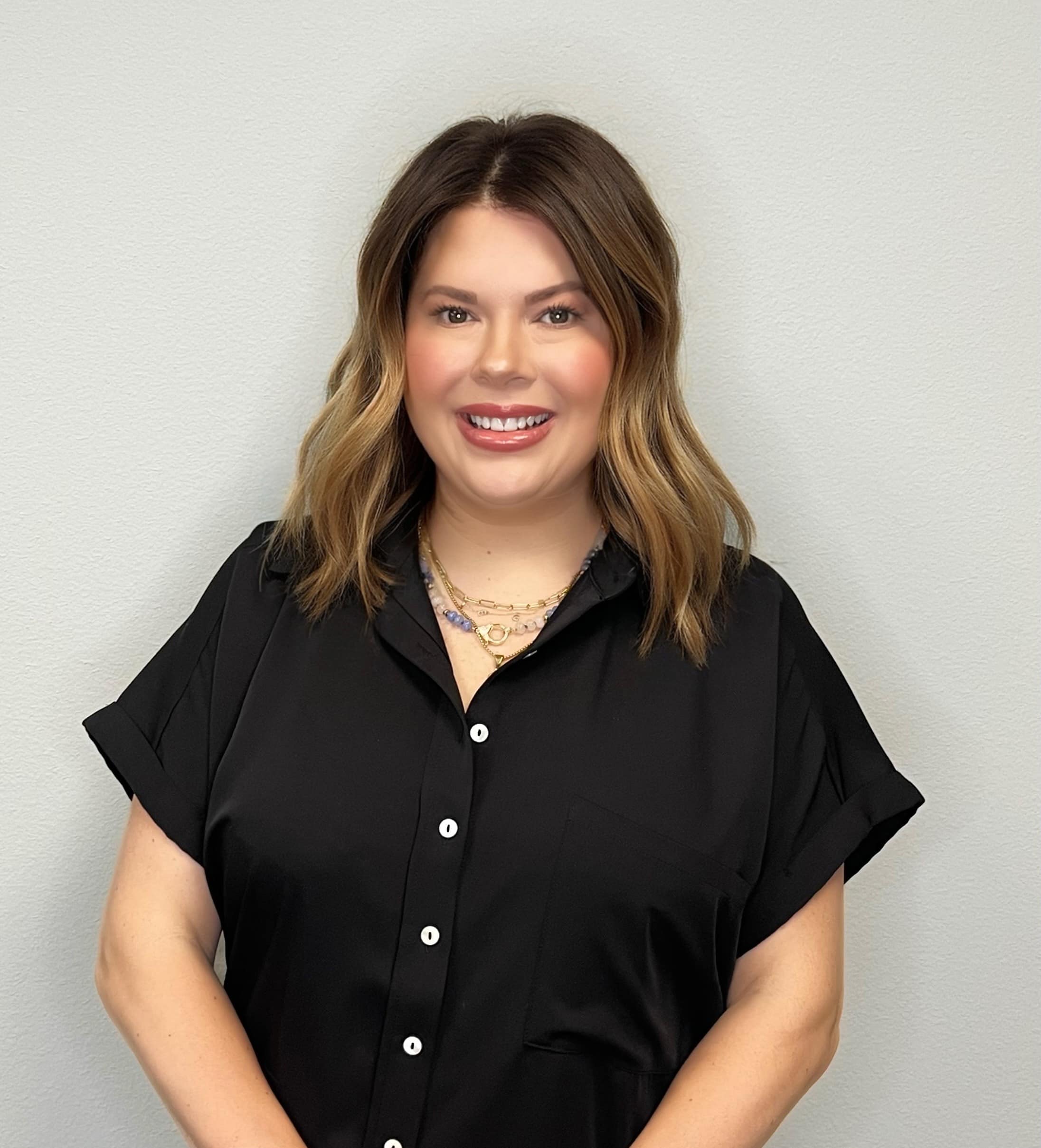 Administrative assistant Gena in the office of Fort Worth Texas plastic surgeon Dr. Kunkel