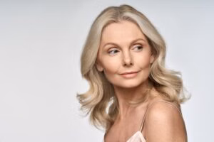 Lively senior woman has a refreshed look following blepharoplasty.